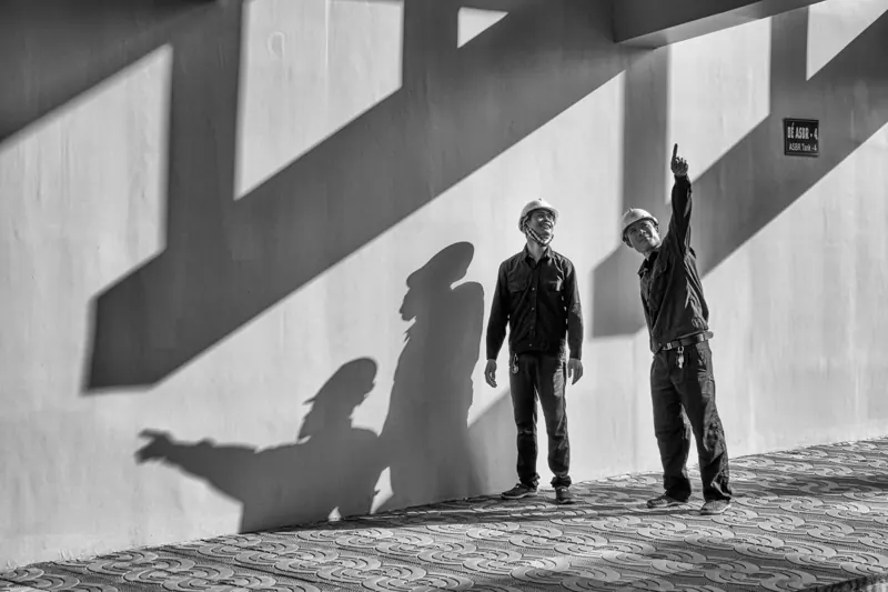 Sample engineers inspecting a construction site